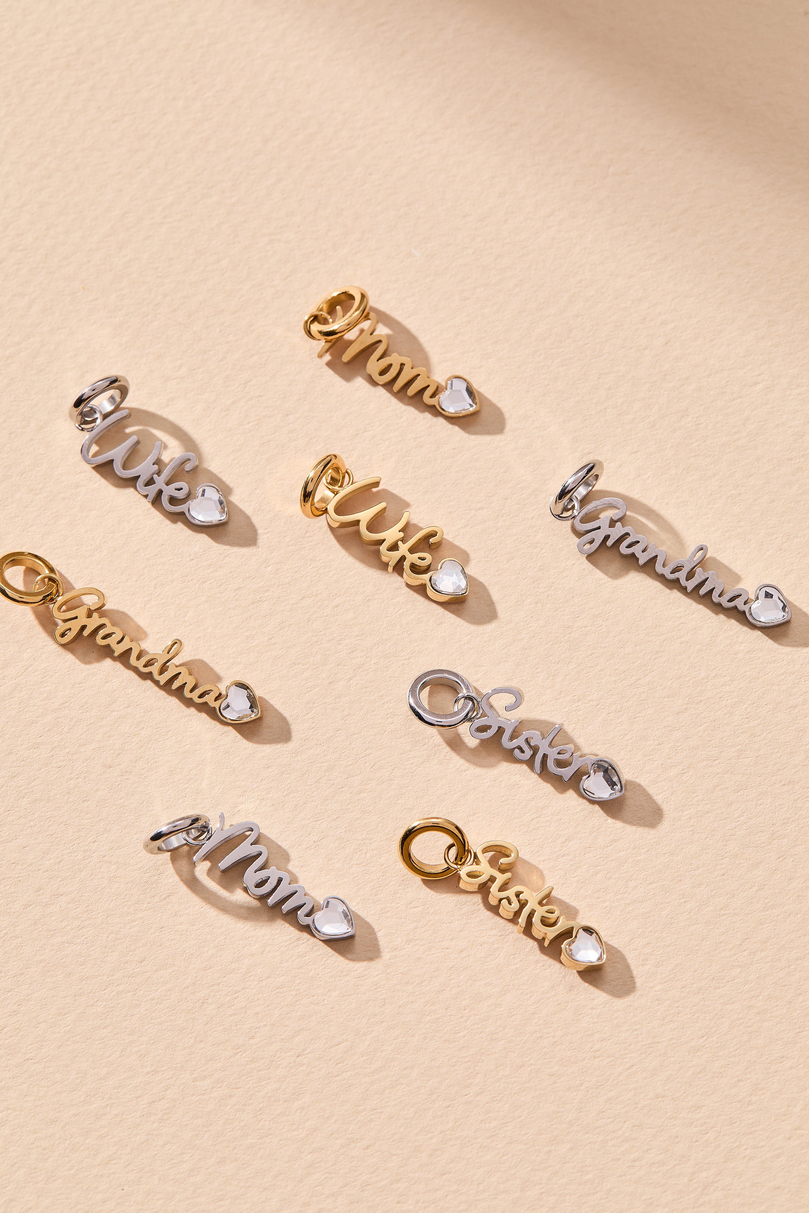 Sister' Elongated Interchangeable Charm
    
    
    
       Stainless Steel Gold | Alex and Ani