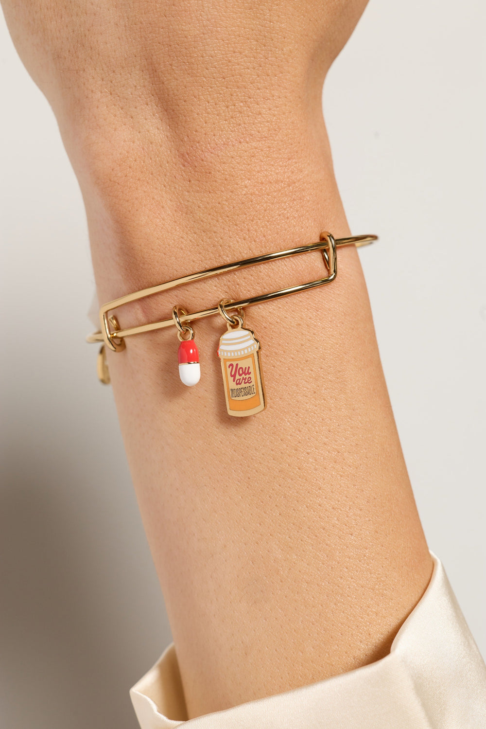 You Are Indispensable' Pill Bottle Bangle
    
    
    
       Gold | Alex and Ani