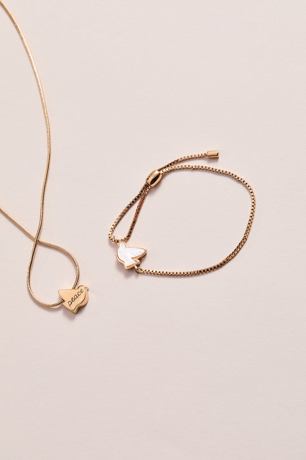 Pearlized Dove 'Peace' Pull Chain Bracelet Gold | Alex and Ani